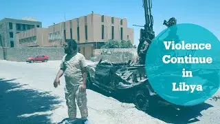 Reports of violence outside Tripoli as peace talks continue