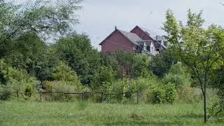 Rural landscape with red house