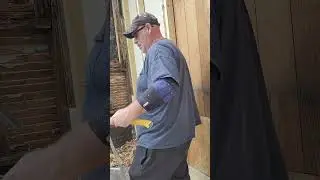Continuation of installing sister stub on the back porch wall.
