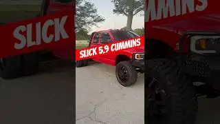 Slick 5.9 Cummins Dually with a Flatbed