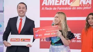 Grupo Americana no palco do Teleton 2022  |  Drogaria Americana e Drogaria Poupe J&aacute;