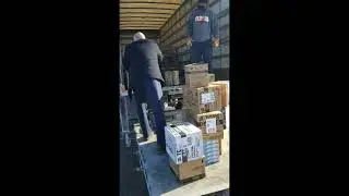 Detroit Rescue Mission: Dr. Chad Audi delivers Hasbro toys to Detroit police
