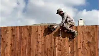Eco Fencing Company, Inc installing Cedar fence