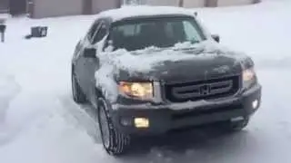 Honda Ridgeline RTL in snowstorm