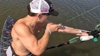Bowfishing on a paddleboard in Lake Pontchartrain!