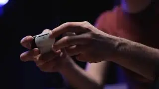 Gaming Stock Footage: Playing video game console on tv hand hold new joystick  4K | HD