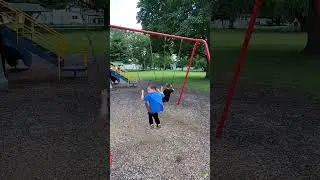 Playing at the playground, learning how to swing!