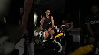 Indoor cycling class is doing choreography during their session!