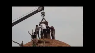 Placing a 2,000 year old Haramika on a maha stupa