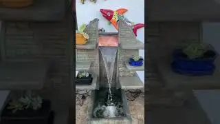 Cast stone shelf display fountain