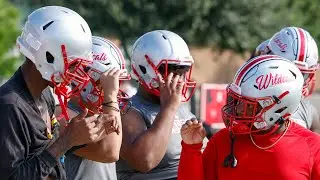 Deaf football players at Woodrow Wilson High School are thriving and teaching teammates