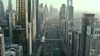 VideoVault Stock Video: Dubai UAE high-rise district at day aerial view