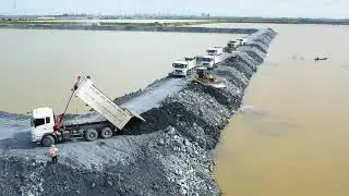 A Amazing construction on water surfaceBy Dozer sahntui pushing stones successfully