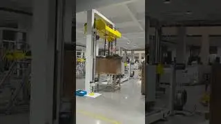 Vertival Strapping machine with top pressing device