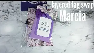 Layered tag swap marcia