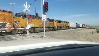 Union Pacific Norfork Southern mixed manifest with mid train helpers yard locomotive