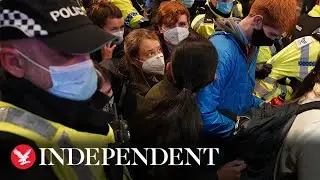 Greta Thunberg mobbed by activists as she arrives in Glasgow for Cop26