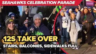Parade energy explodes in downtown Seattle as fans pack sidewalks and balconies