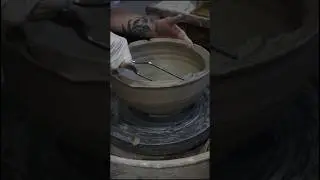 trimming a bowl with a cheese slicer