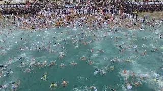 Over 4,000 people fight off cold at South Korea&rsquo;s winter swim festival