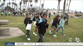 Hundreds of students participate in beach cleanup for Kids Ocean Day