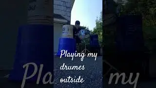 playing drums outside