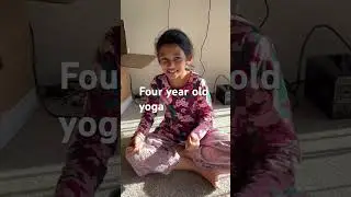 Four year old doing Yoga with his sister
