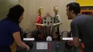 DIVORCE A tug of war arcade machine where you turn the handles to separate from your partner