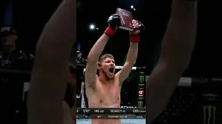 Bryce Mitchell holds up the Bible and yells 
