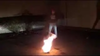 Flaming Kettlebell Juggling