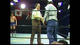 Dick Slater and Dory Funk Jr.  vs Mike Rotunda.  1983