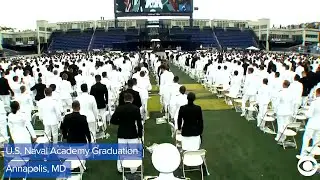 WEB EXTRA: US Naval Academy Graduates Toss Caps In The Air