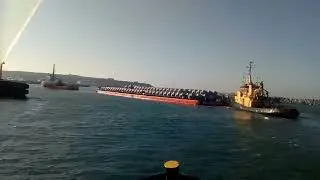Tugboat Mentor, Tugboat Bestla and Tugboat Goliath Vig taking carrier 10 into Hanstholm harbour
