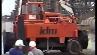 Straddle Carrier transporting a Heat Exchanger - Kidextractor - www.kidextractor.net