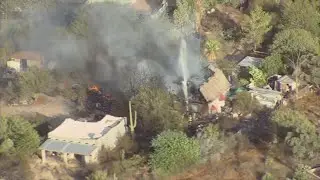 Arson investigators looking into a fire in Cave Creek