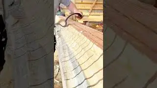 Traditional Hand Hewing Technique for Shaping Timber with a Curved Drawknife Tool