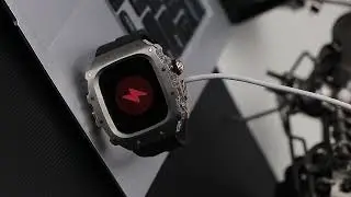 Titanium Apple Case, Metal Buttons, Clear Frame, Fluoroelastomer Strap.