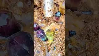 Blue crystal ball and pink crystal set in the rock. Very much and easy to mine