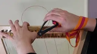 Re-stringing a backward strung harp