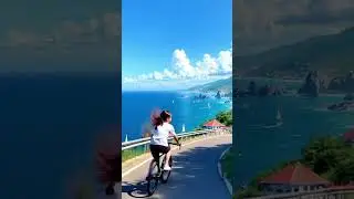 Riding through serenity 🌊✨  Anime girl cycling by the beach, lost in the beauty of the moment. ⛱️✨