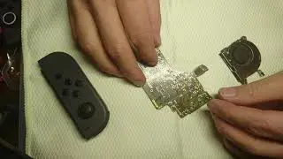 Nintendo Switch joycons not charging and no fan-spin could be because of faulty AJZ-chip.