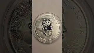 2016 Royal Canadian Mint 1 oz Superman S-Shield silver bullion coin.