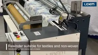Fabric rewinding machine with tension control and meter programming
