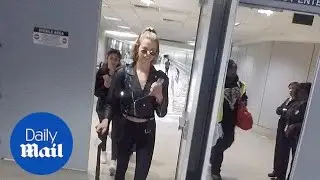 Hailey Clauson is back in black when landing at LAX airport - Daily Mail