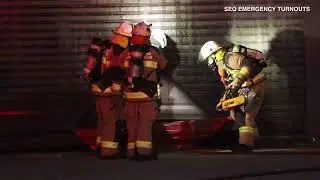 Multiple QFR trucks on scene of a structure fire in Hemmant.