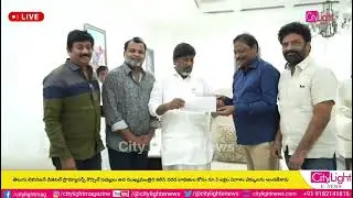 Telugu Television Digital Producers Council  over a donation check of Rs5 lakhs for the floodvictims