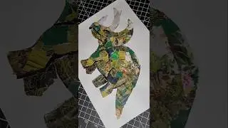 Making a dinosaur collage with magazine pieces 🦕