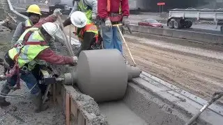 Curb Roller Mfg's Hydra-Screed with a Deep Flume Drum