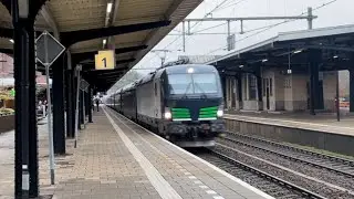 NS Vectron with new colors carrying Nightjet past Naarden-Bussum
