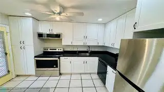 6061 N Falls Cir Dr, Lauderhill, FL Presented by The Bonfiglio Team.